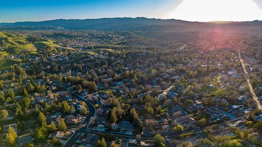 Wallnut Creek Aerial Panorama. Suburban city and green hills at sunset