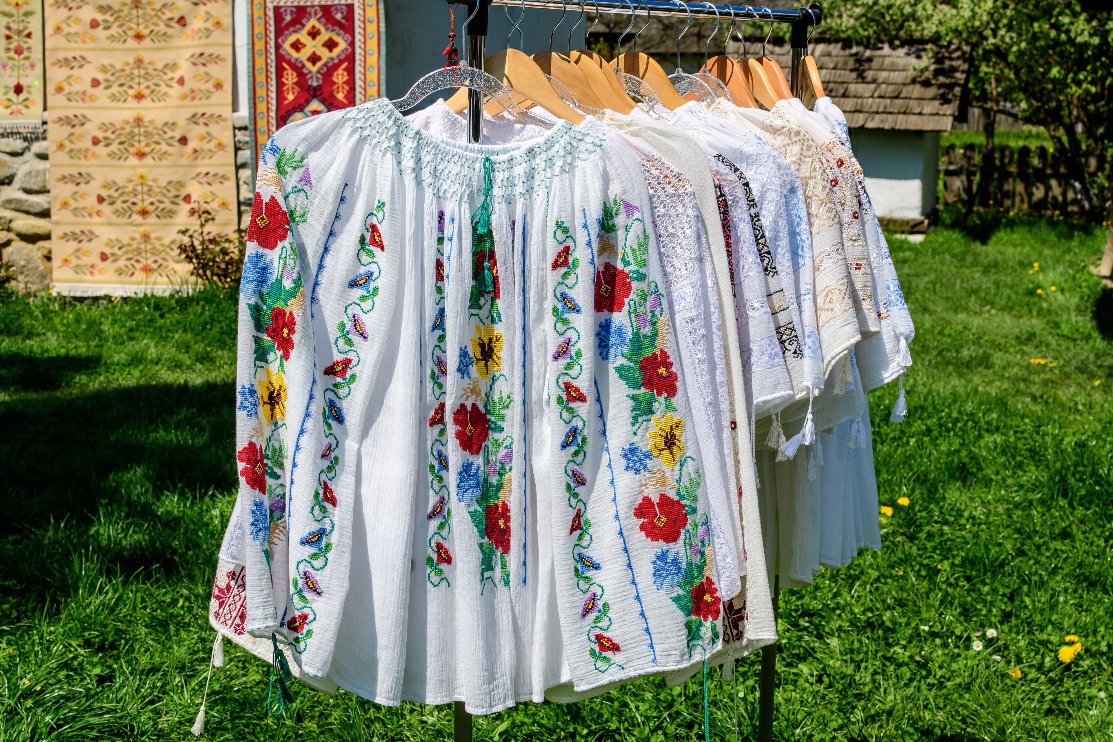 Traditional Romanian hand made clothes displayed for sale at a hand made festival in Bucharest, Romania.
