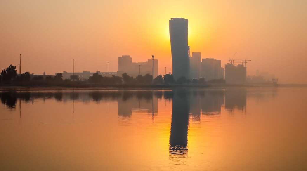 Sunrise Sky view background behind capital gate tower of Abu Dhabi, Skyscrapers in Capital city of United Arab Emirates