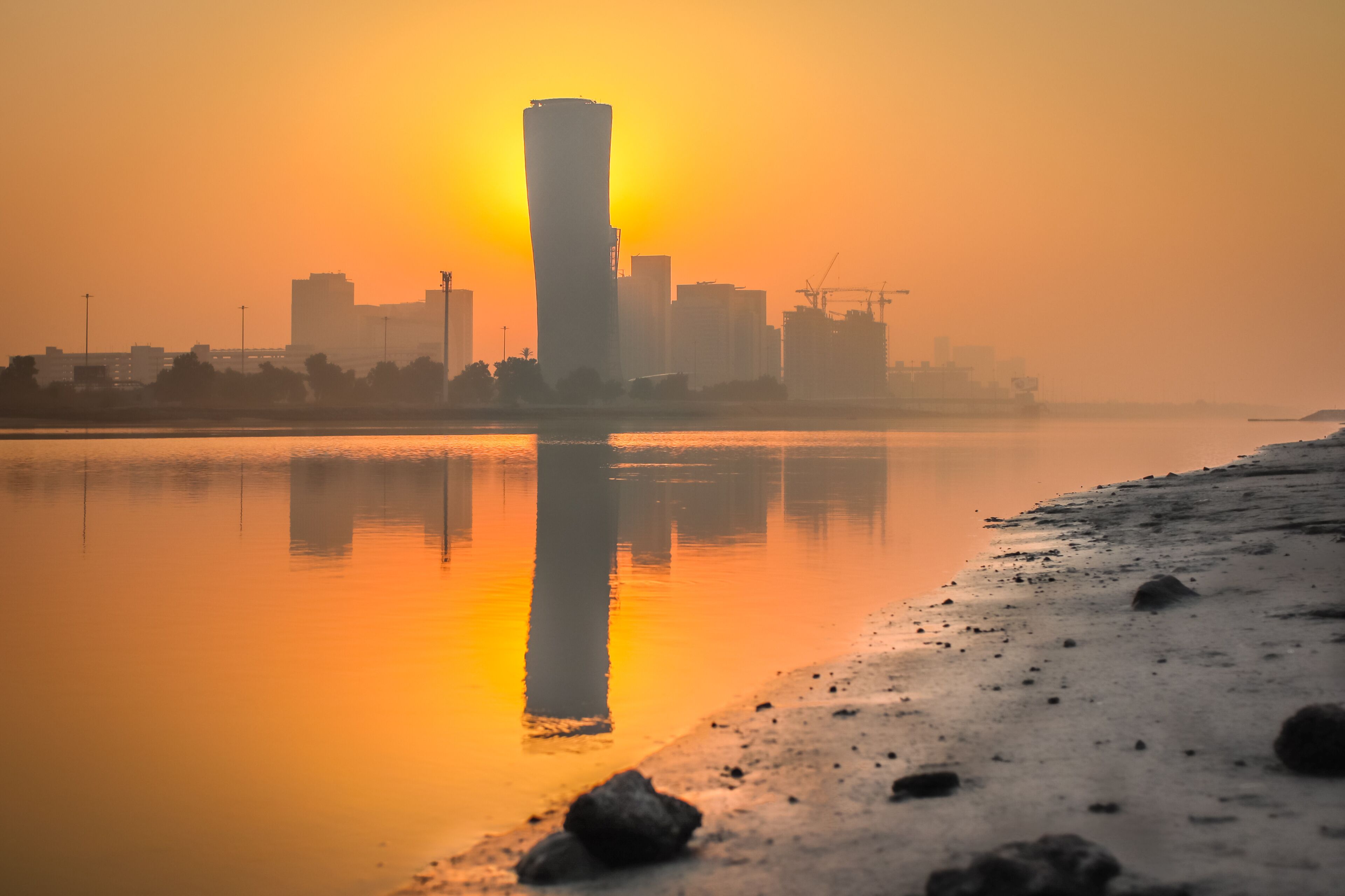 Sunrise Sky view background behind capital gate tower of Abu Dhabi, Skyscrapers in Capital city of United Arab Emirates