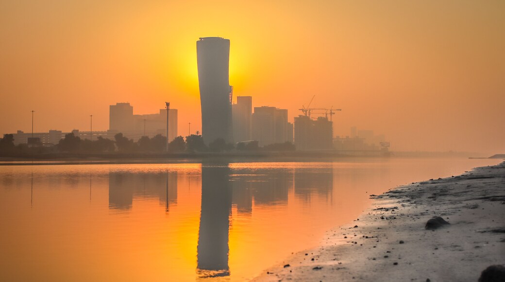 Sunrise Sky view background behind capital gate tower of Abu Dhabi, Skyscrapers in Capital city of United Arab Emirates
