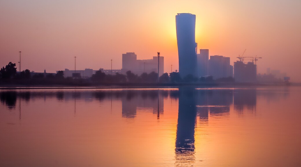 Sunrise Sky view background behind capital gate tower of Abu Dhabi, Skyscrapers in Capital city of United Arab Emirates