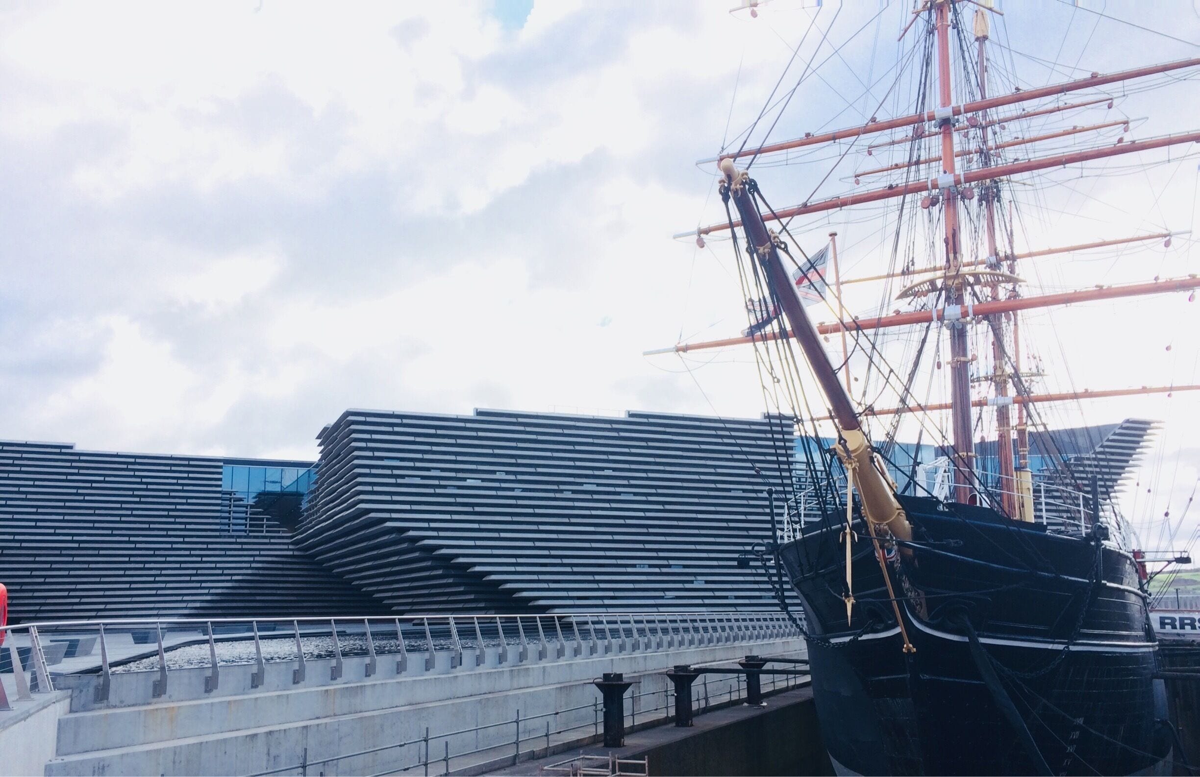 Captain Scott sailed to the Antarctic on the RRS Discovery pictured. They arrived on January 8th 1902. https://www.rrsdiscovery.com/exploration-article/the-story/
Behind the ship is the first V&A museum to be built outside of London, by Japanese architect Kengo Kuma; It is due to open on September 15th 2018.