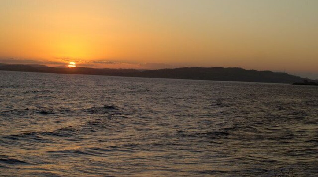 Sunset on the River Tay Estuary To the left would be Tentsmuir Forest and to the right would be Tayport. Broughty Castle is on the extreme right.