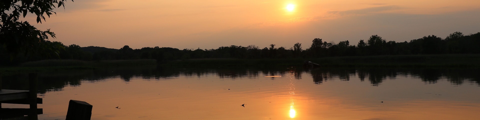 The sun sets on the Bush River where headwaters start wide and are full of wildlife.