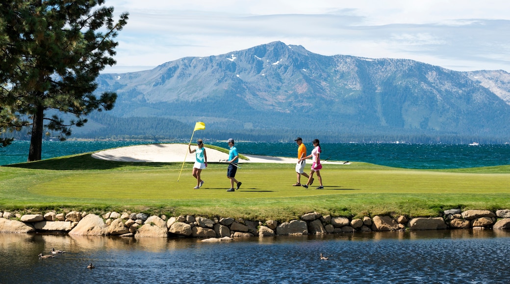 A group of friends golfing at Edgewood Tahoe in Stateline, Nevada.