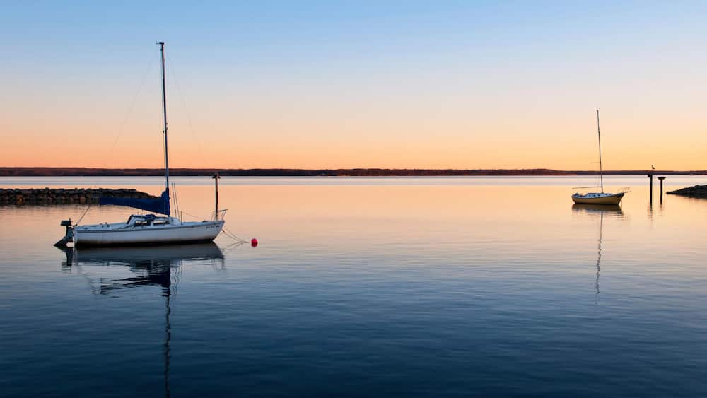 ENH9DH Sailboats at dusk, Leesylvania State Park, Prince William County, Virginia USA