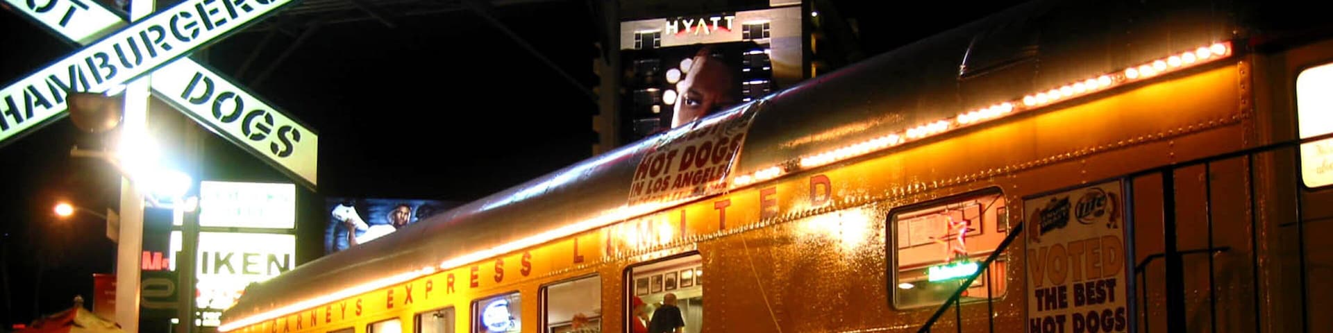West Hollywood featuring signage and night scenes