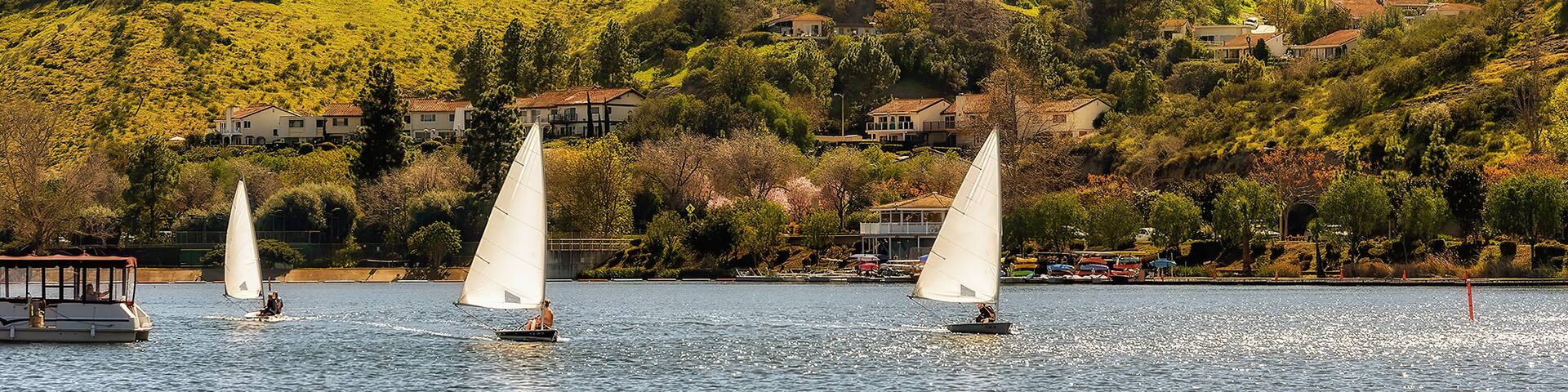 Panoramic view of sailboats in Westlake lake, in the upscale community of Westlake Village in southern California.
