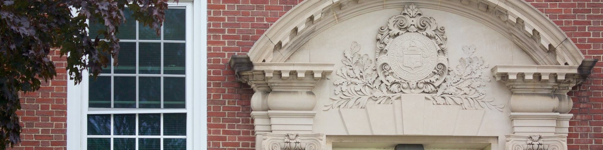 Woburn which includes an administrative buidling and street scenes