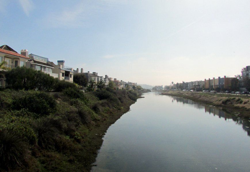 Walkway along the Ballona Lagoon, runs just one block behind the beach and leads you from Marina del Rey back to Venice and its canals. The lagoon is a very quiet and beautiful place, surrounded by interesting houses and their gardens

http://bigcitiesbrightlights.wordpress.com/2014/05/26/marina-del-rey-venice-beach-a-walk-along-the-ballona-lagoon/