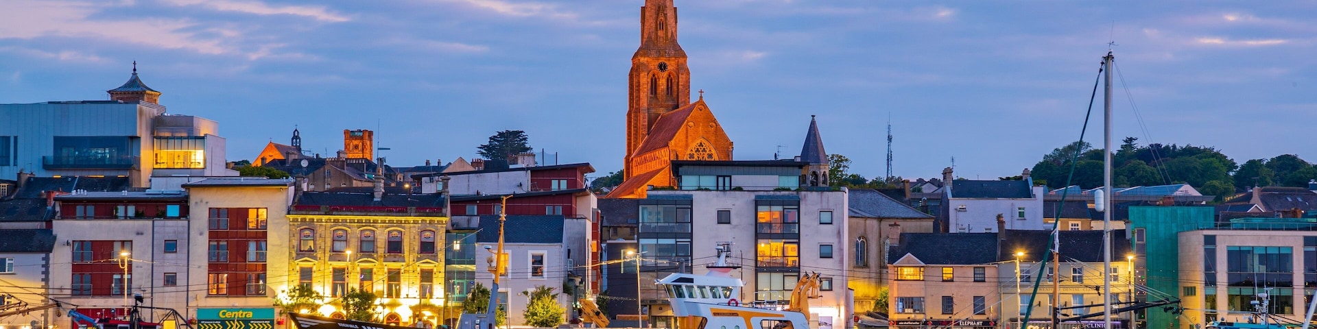 Wexford showing a city, a coastal town and a sunset
