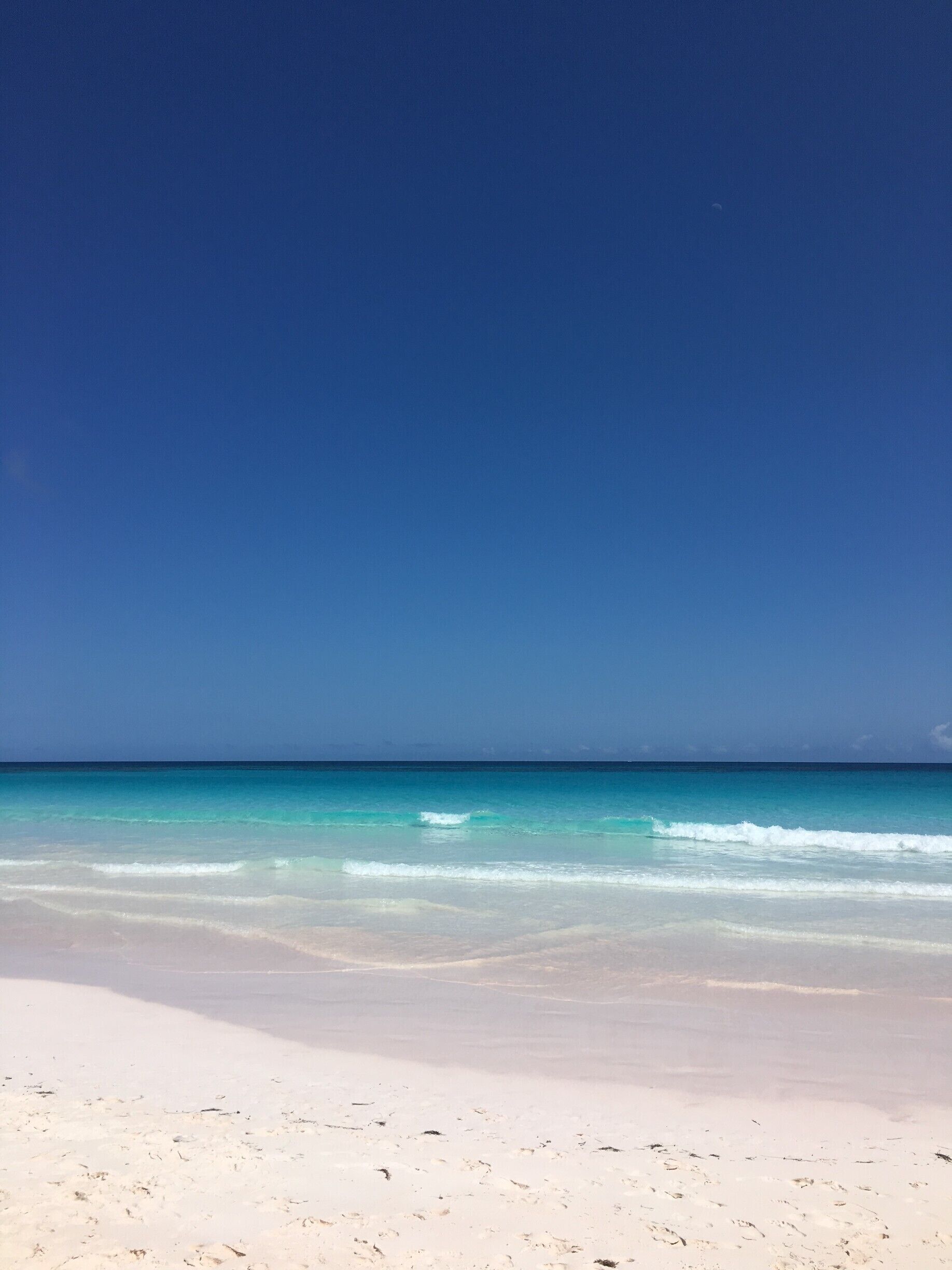 By far the most beautiful beach I have ever seen.  The sand truly is a light pink and it's so soft.  