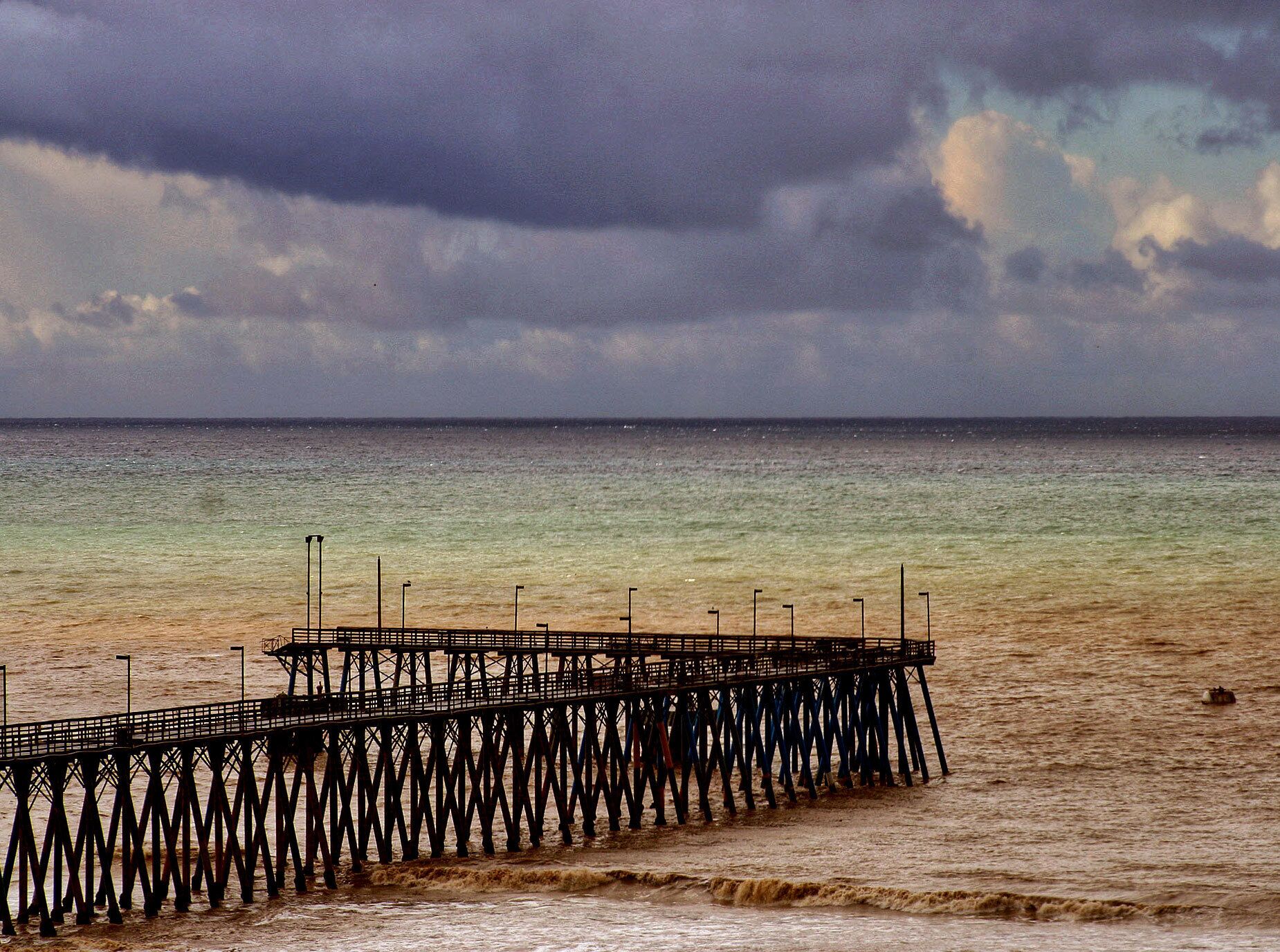 Winter storm rolls in across the Pacific and hits the shores of Baja. I liked the colors in the water and sky. With big storm expected overnight, we took a break from camping and cooking, staying in a motel and eating a big mess of fish tacos for dinner with some margaritas in the hotel bar. The surf zone is super muddy and thus "sharky" as the surfers like to say. (Since the sharks can't see you in the mud, you might be more likely mistaken for a seal instead a surfer.