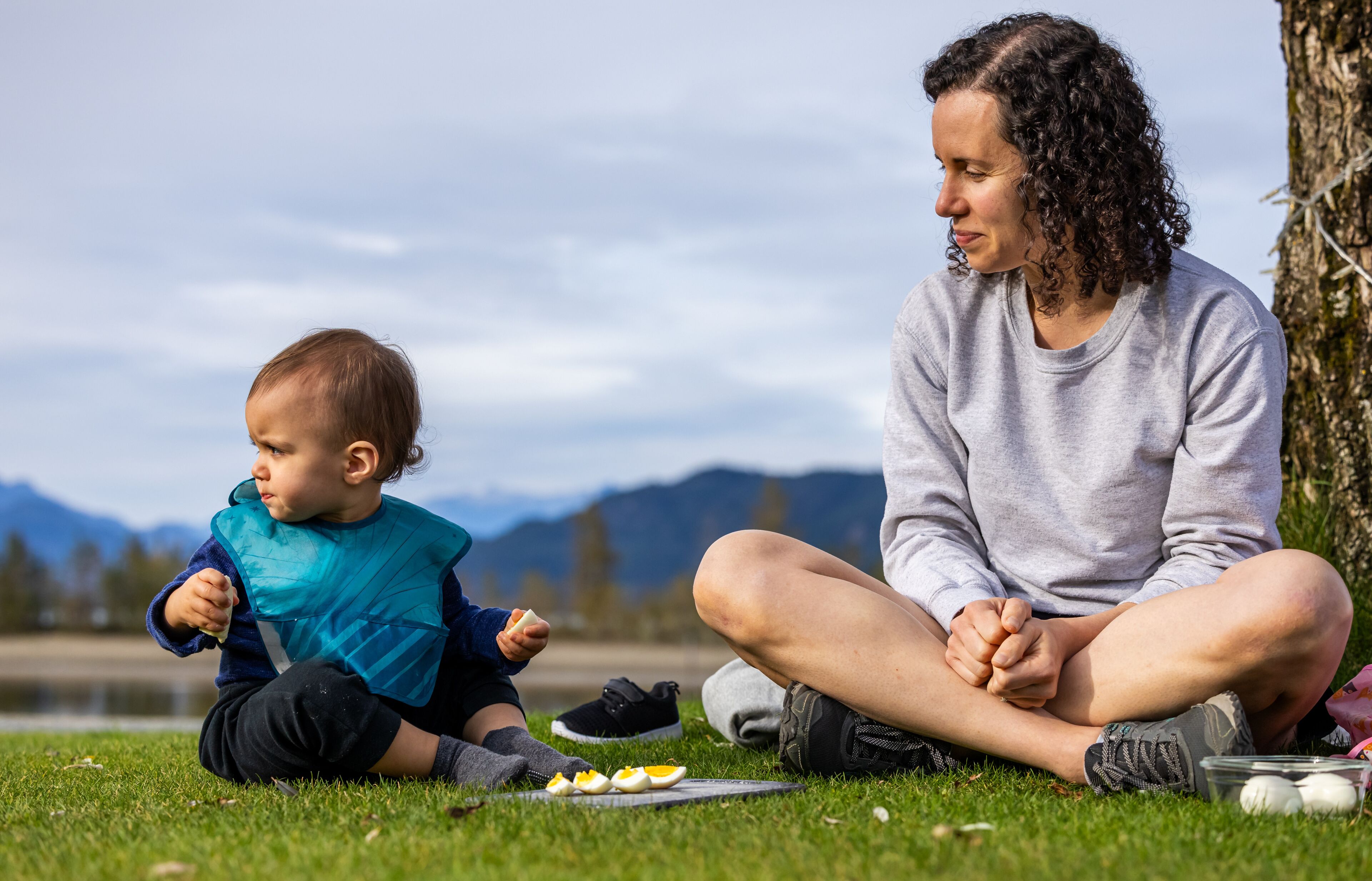 Mother and Child Enjoy Picnic at Harrison Lake