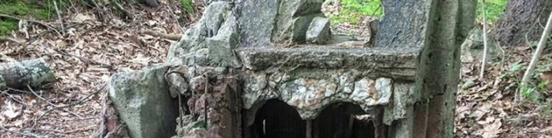 Either off access road at the end of Old Waterbury Rd, or Umberfield Rd. Abandoned in the woods near I 84 and power lines overhead.