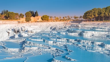 One of the main tourist attractions in Turkey is the travertines and Pamukkale hot springs. Scenic panoramic view on turkish resort
