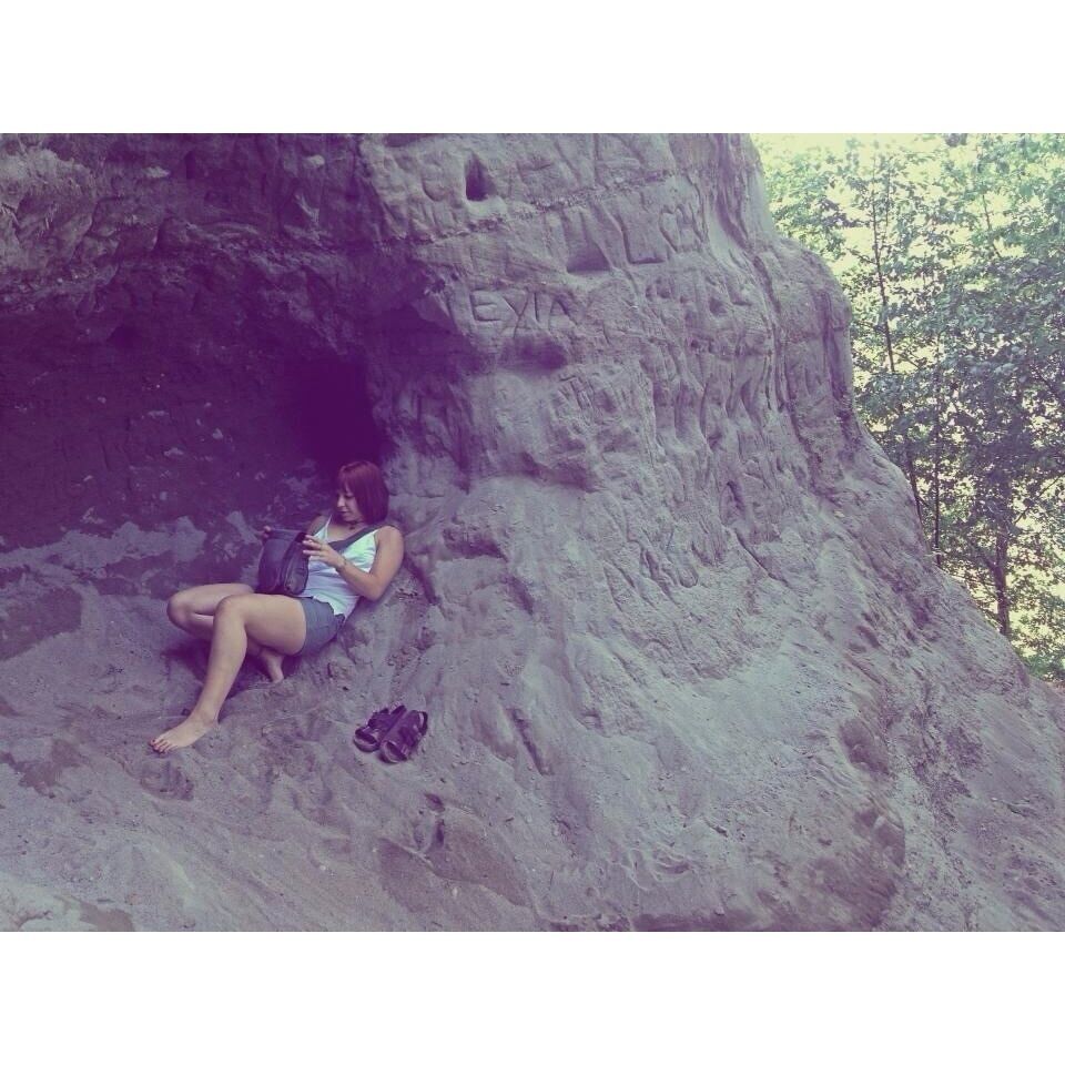 If you walk down Owen Beach you'll come to some hand holds in the cliff. if you're brave enough to climb them (be careful their sketchy) you'll come to this place. Such a great place to chill. 