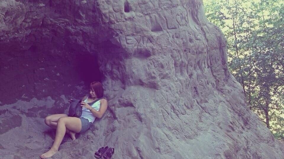 If you walk down Owen Beach you'll come to some hand holds in the cliff. if you're brave enough to climb them (be careful their sketchy) you'll come to this place. Such a great place to chill.