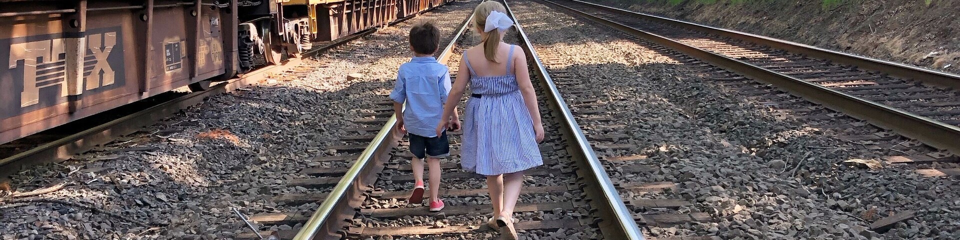 Train tracks are viewable from a bridge which connects to an abandoned park and a functional park. #traintracks #trains #children #amtrak #tacoma #bridge #washingtonstate #wa #pnw