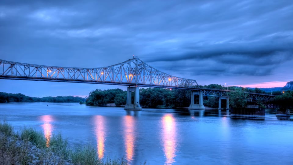 HDR image of bridge over the Mississippi River at dusk