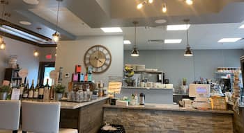 Stopped here on a rainy camping day after watching a movie at the local movie theater- now my kids want to move here! Great and classy coffee shop- beer and wine, food menu and bakery items- also has used books for sale, free WiFi, comfy chairs and long marble bars for socializing. Great spot!