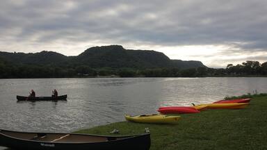 Canoes for rent in the summer on Lake Winona in Winona, Minnesota