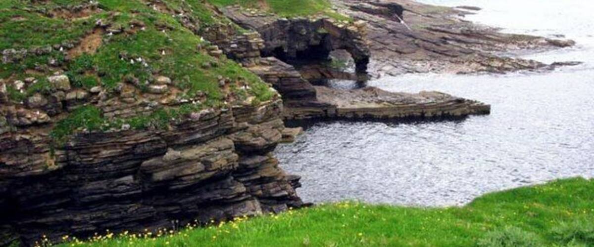 Natural Arch at the foot of North Hill Westray Orkney