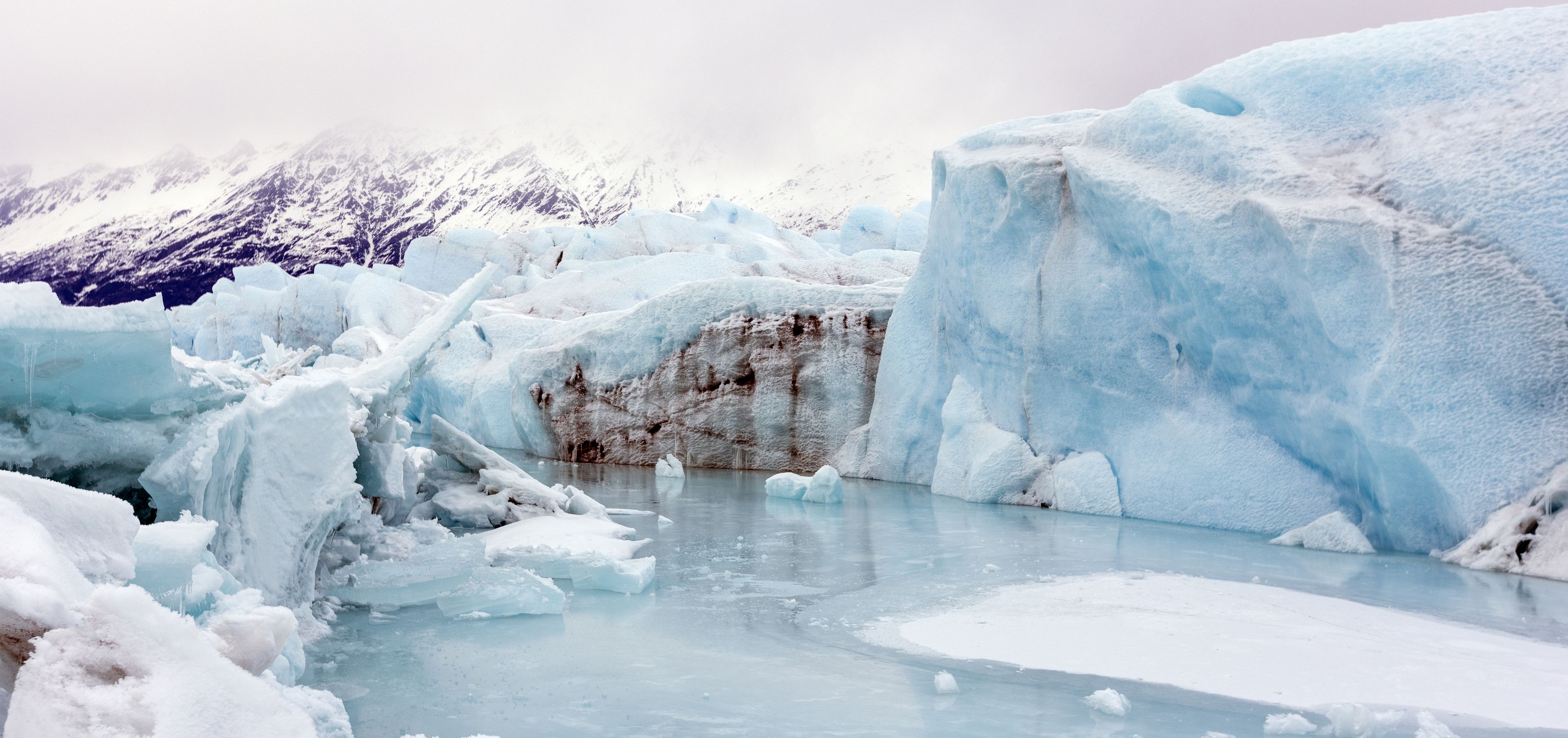 Massive Blue Ice Formations and Meltwater Pools of the Knik Glacier in the Chugach Mountains, Palmer, Alaska