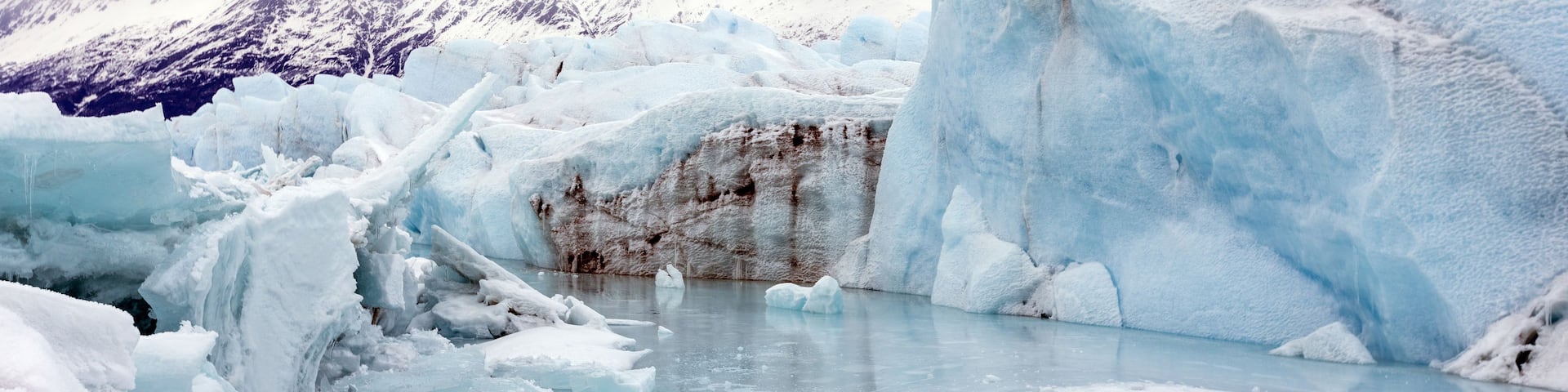 Massive Blue Ice Formations and Meltwater Pools of the Knik Glacier in the Chugach Mountains, Palmer, Alaska
