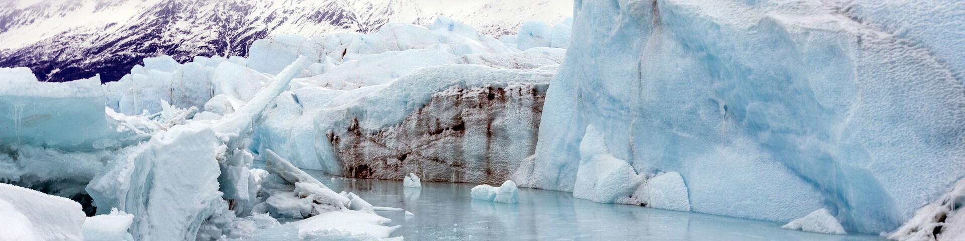 Massive Blue Ice Formations and Meltwater Pools of the Knik Glacier in the Chugach Mountains, Palmer, Alaska