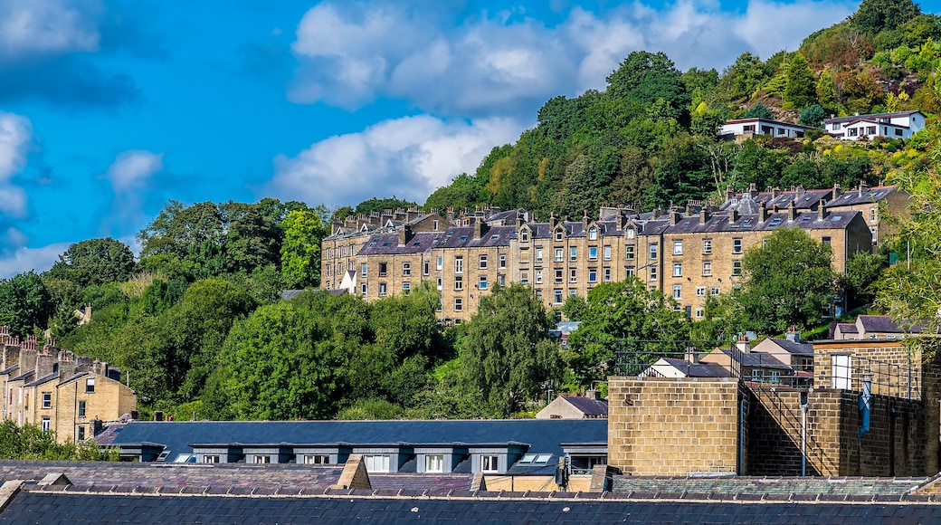 A view of terrace buildings on the valley side of Hebden Bridge, Yorkshire, UK in summertime