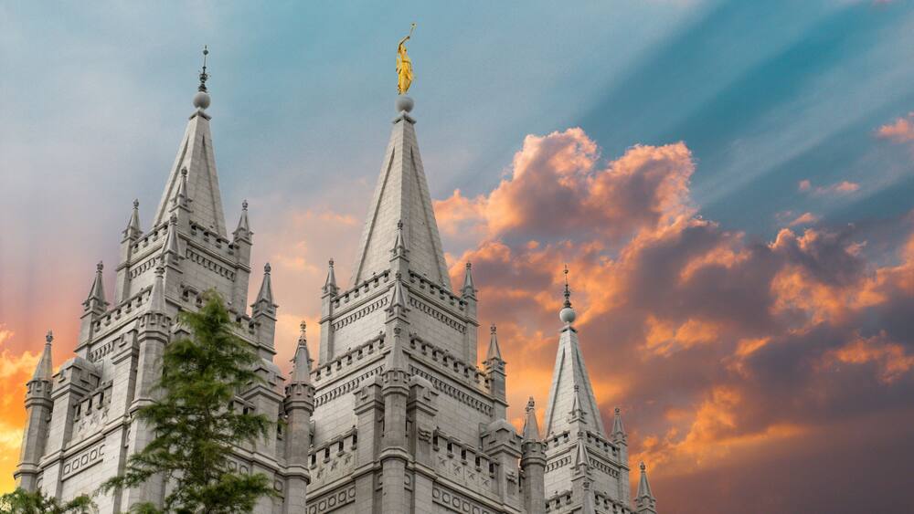 A grand, Gothic-style building with multiple spires and intricate stonework.