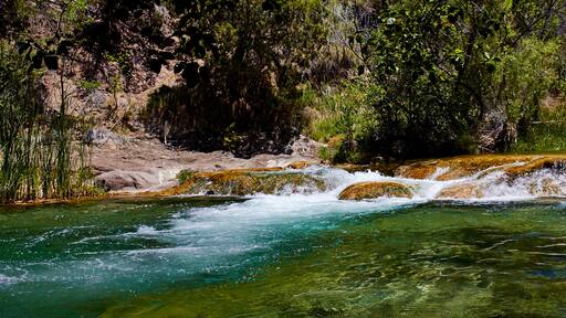 Clear water running over rocks at Fossil Creek, Arizona