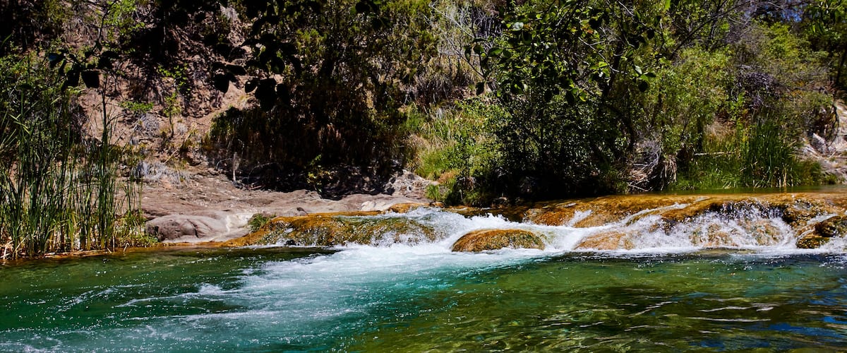 Clear water running over rocks at Fossil Creek, Arizona