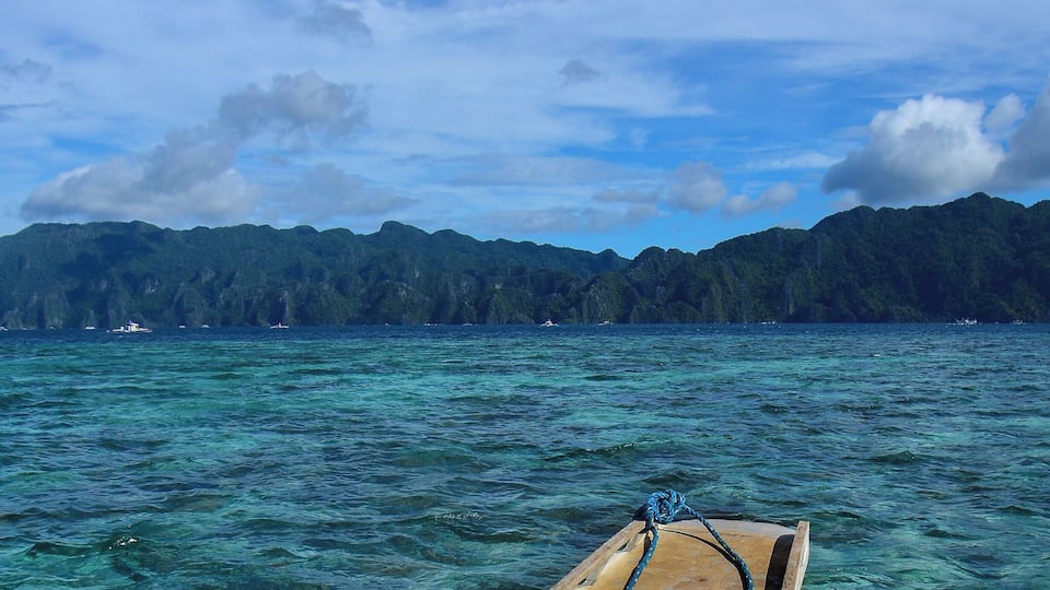 Banka boat and Coron Bay, Coron, Palawan, Philippines #Beachtips
#BvsBlue
#adventure