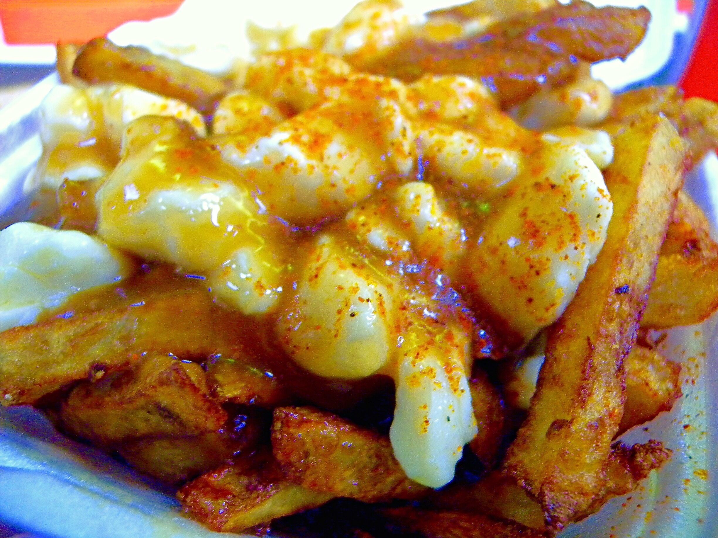 Delicious and #golden “Poutine” is one of the most favourite street foods or dish in Canada and has been called "Canada's national dish". It’s a dish originating from the Canadian province of Québec, consisting of French fries and cheese curds topped with a brown gravy. 
#Canada #Quebec #poutine #StreetFood #Drummondville #GoodEats