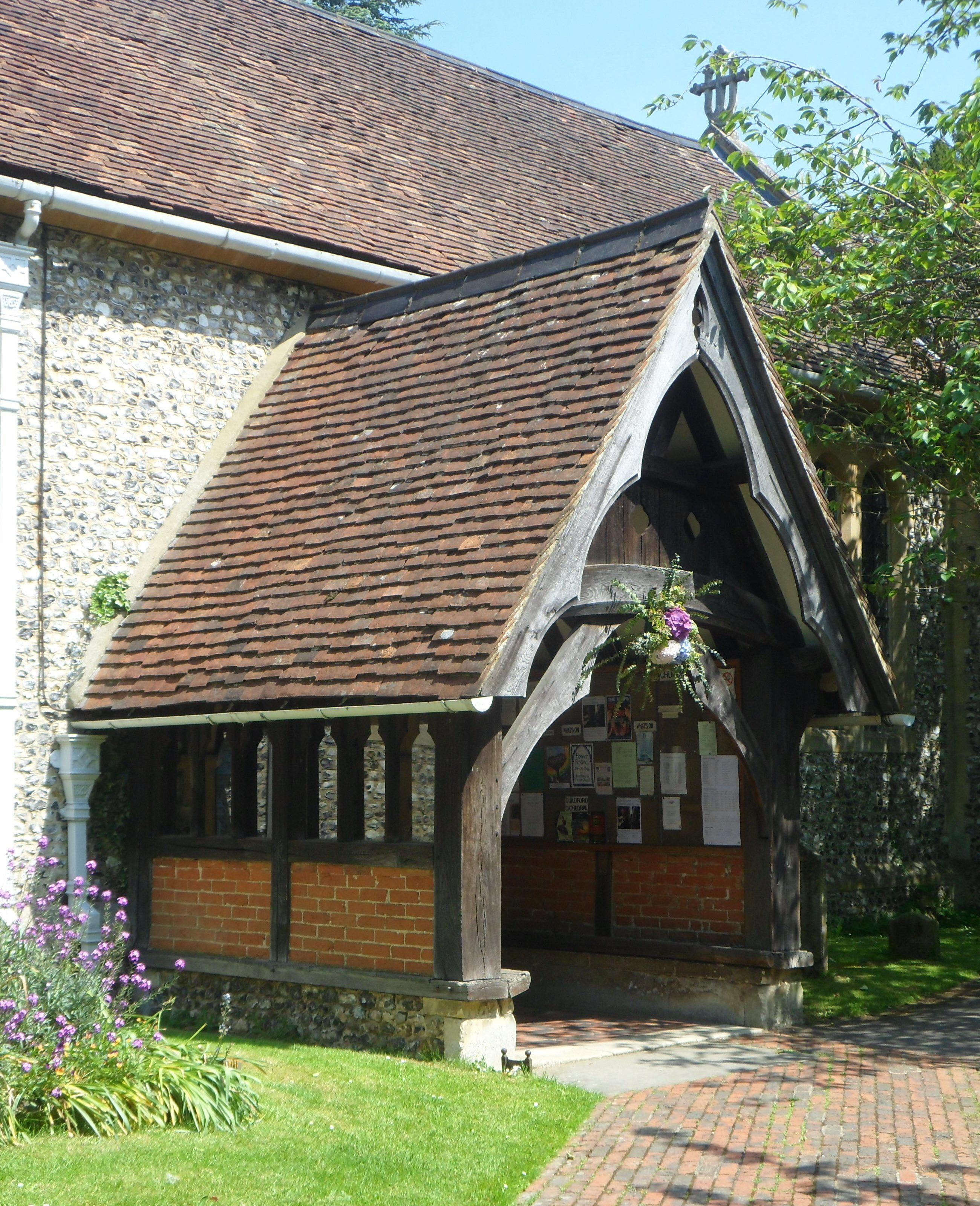 Porch of St Martin's Church, Ockham Road South, East Horsley, Borough of Guildford, Surrey, England.