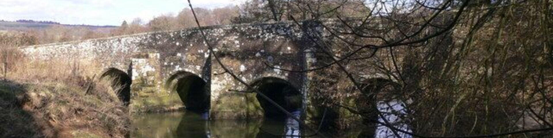 15th or 16th century bridge over the River Rother at Woolbeding, West Sussex.