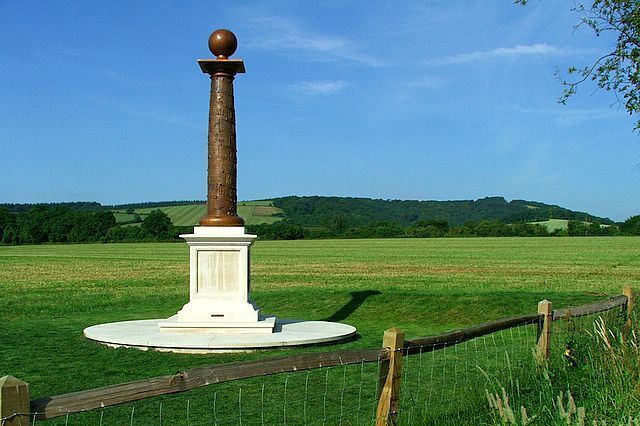 Cocking History Column. The Column was designed by eminent sculptor and villager Philip Jackson to celebrate The Millennium and a thousand years of Cocking History. The plinth houses two Millennium Maps and on the column there is a spiral of bronze plaques depicting village history. The plaques were engraved by Cocking villagers under Philip Jackson's direction. The plinth was finally unveiled on 15 April 2005 by Lady Cowdray.
