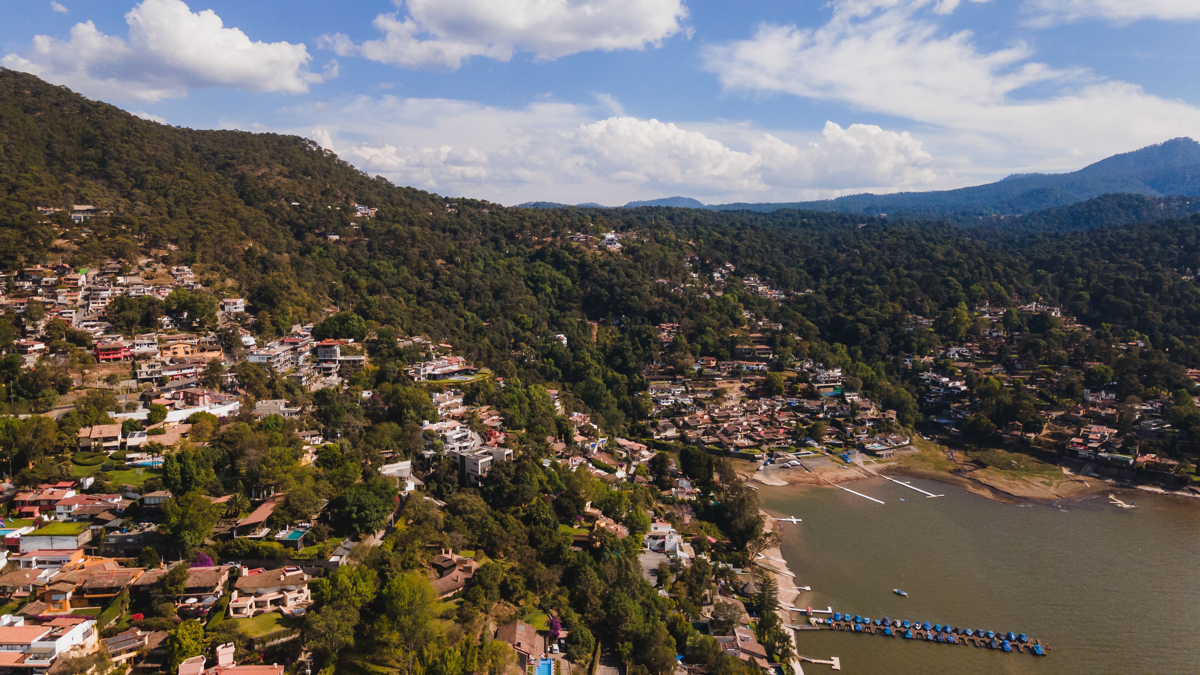 Aerial photography of the landscape on the dam of Valle de Bravo in Mexico, the sailboats are distinguished.  4