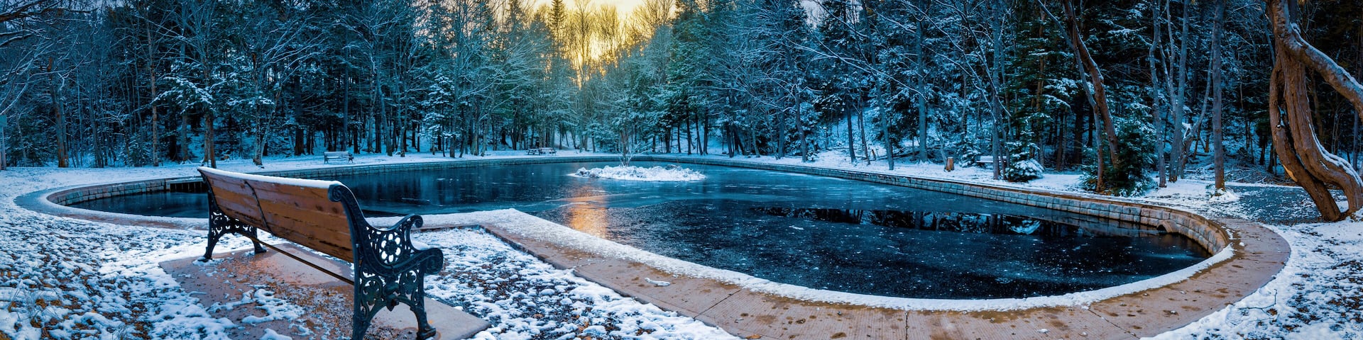 Lonely Moment at Heart Shaped Pond - The cold weather has arrived, the hardwood trees no longer have foliage, ducks have left the pond and the bench is empty. Loneliness is a rarity at the pond.