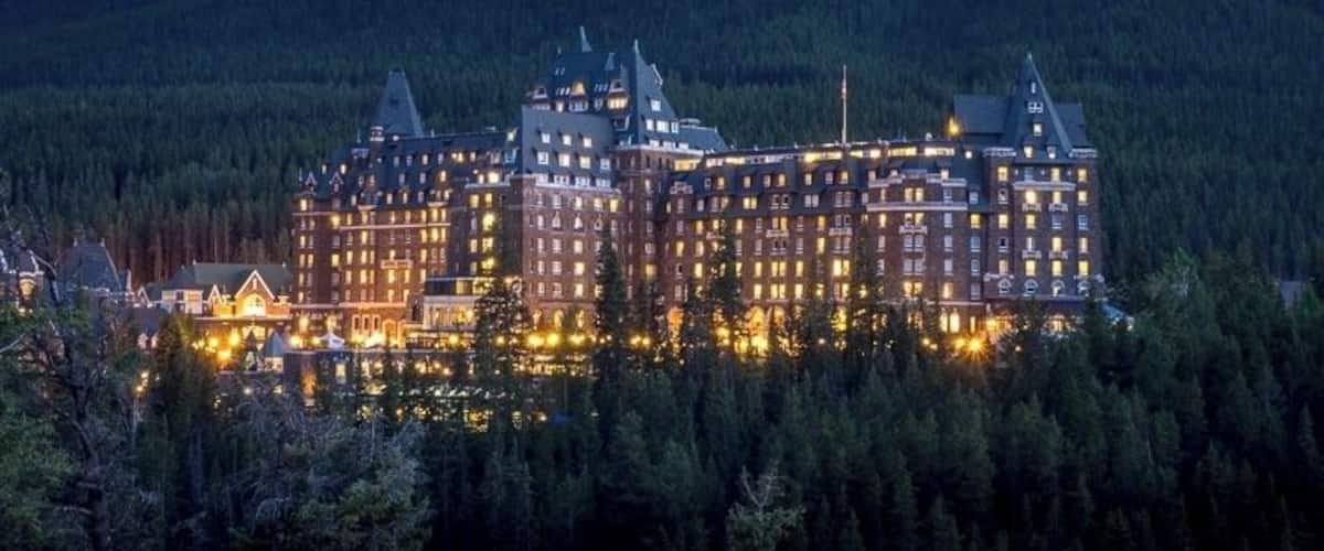 The majestic Banff Springs Hotel lights the night in Banff National Park. If you have a chance to visit Banff then you might be wondering where to go to get this iconic shot of the Springs. Well...... Locals refer to the spot as Surprise Corner and wow... when you see this view coming around the corner on Tunnel Mountain Road its hard to keep your wheels on the pavement. So yes... its a surprise! Get here at blue hour.