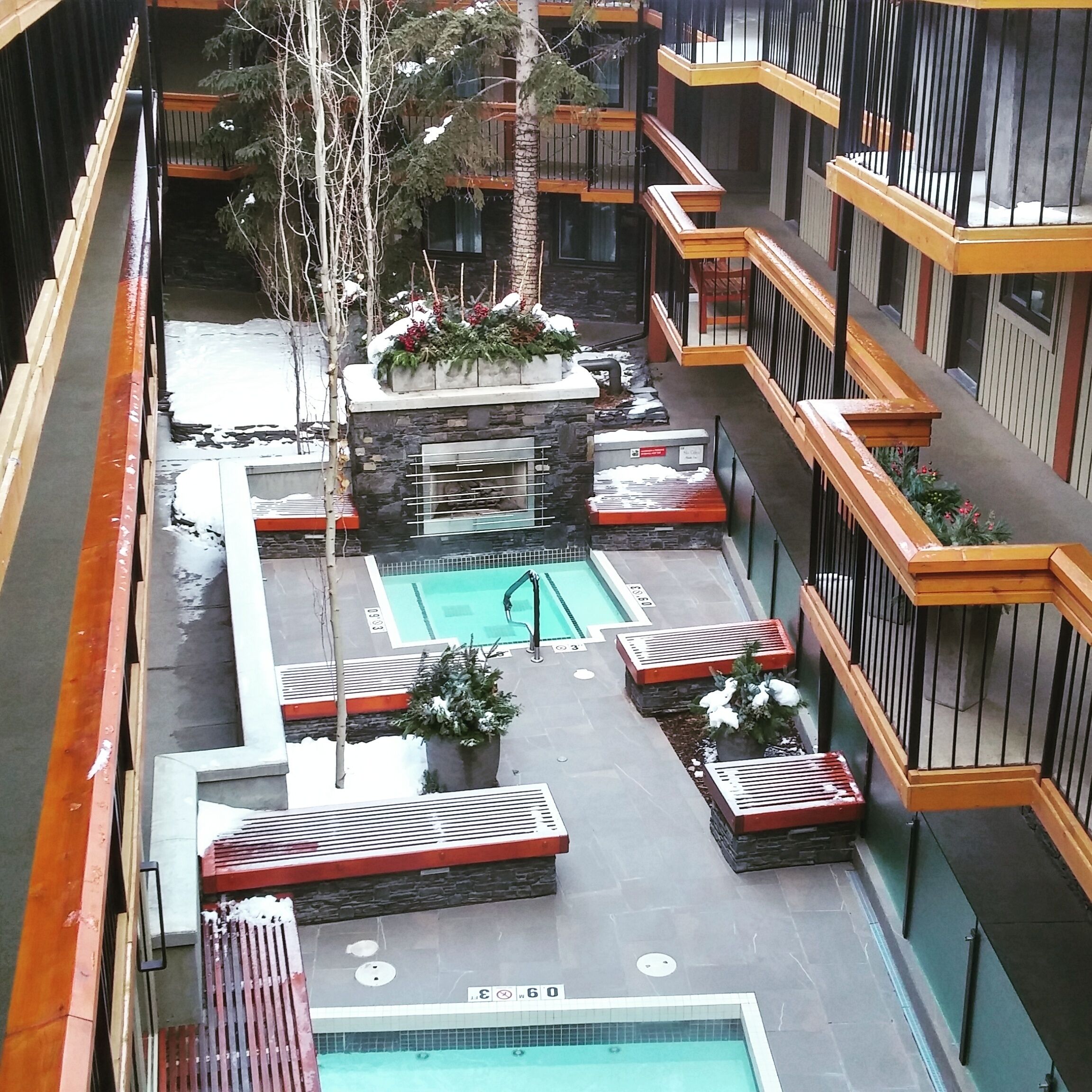 While in Banff I stayed at Banff Aspen Lodge. While the hotel was incredible the noise not so much. It's a super affordable hotel which tends to attract younger partiers. 

While I didn't get much sleep I did enjoy the fireside outdoor hot tubs. 

Towels are provided by the hotel and there is a local coffee shop right in the lobby.

The hotel serves a full breakfast, has free WiFi and parking.