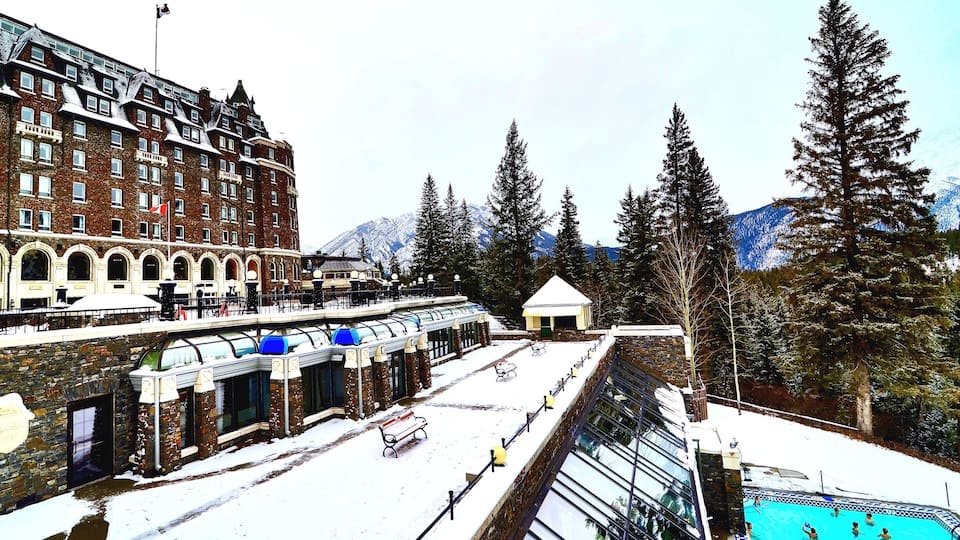 The Fairmont Banff Springs Hotel built in 1888, is styled after a Scottish Baronial castle and is a National Historic Site of Canada. Located in Banff National Park. It has a 32 m lap pool and a 20 m heated outdoor pool, the outdoor pool is considered one of the best scenic outdoor springs in the world.
#Canada #Alberta #Banff #springs #BanffNationalPark #hotel #outdoor #winter #pool