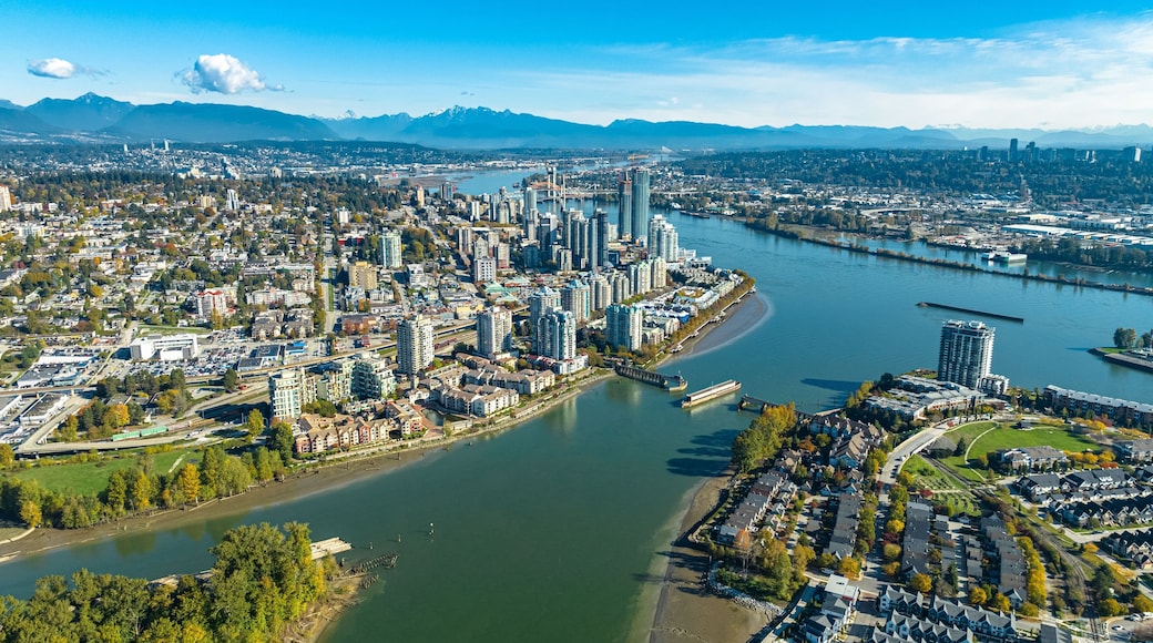 Aerial view of New Westminster skyline along Fraser River
