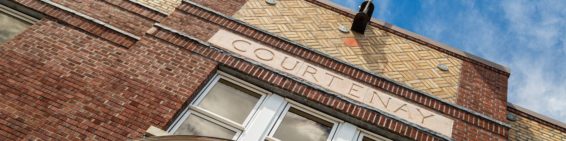 Courtenay showing an administrative buidling, heritage elements and signage