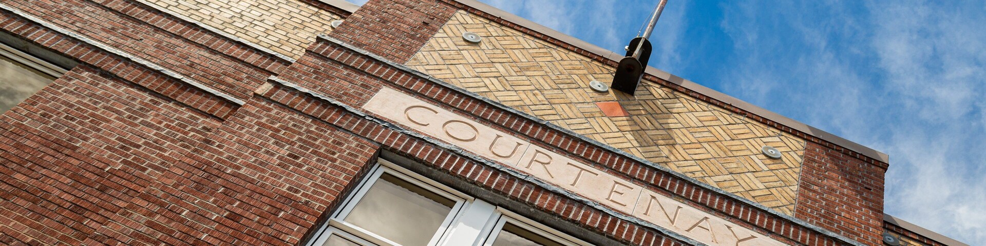 Courtenay showing an administrative buidling, heritage elements and signage