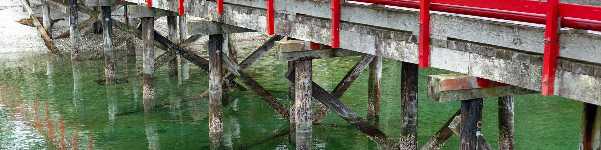 Red pier on Cortes Island, BC Canada