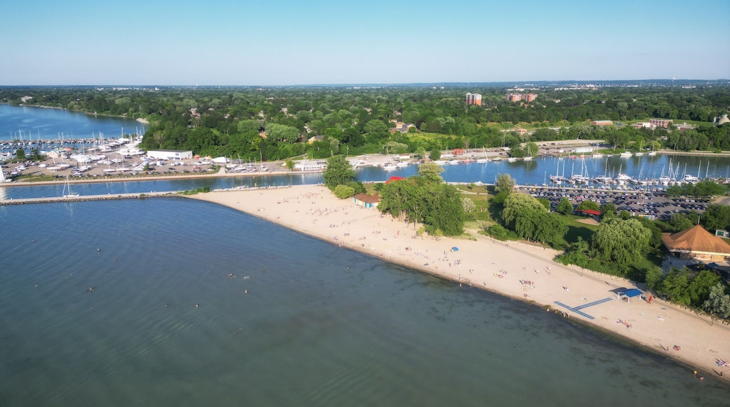 Aerial over Lakeside Park Beach in the Port Dalhousie area of St. Catharines, Ontario, Canada, on the south shore of Lake Ontario, with Martindale Pond. Shot on a summer afternoon in July, 2024.